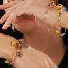 Wholesale 316L Stainless Steel Open Bracelet With Robot Cat Bell Creative And Popular Electroplated
