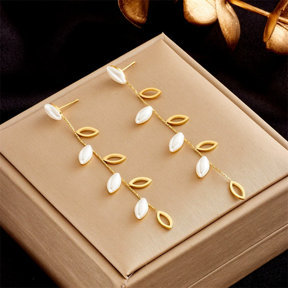 Wholesale Titanium Steel Pearl Hollow Leaf Long Hanging Earrings For Women With Electroplating Design