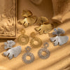 Wholesale Titanium Steel Retro Style Round Flower Earrings With Electroplating Treatment For Women