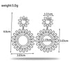 Wholesale Titanium Steel Retro Style Round Flower Earrings With Electroplating Treatment For Women