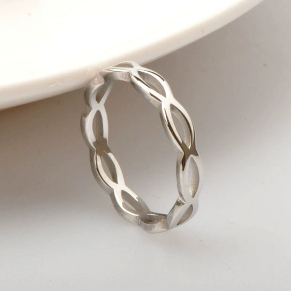 Wholesale Titanium Steel Rose Gold Hollow Wave Fashion Simple Couple Ring Electroplated