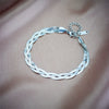 Wholesale Titanium Steel Snake Bone Chain Necklace And Threestrand Braided Bracelet With Geometric Design And Electroplating Treatment For Unisex