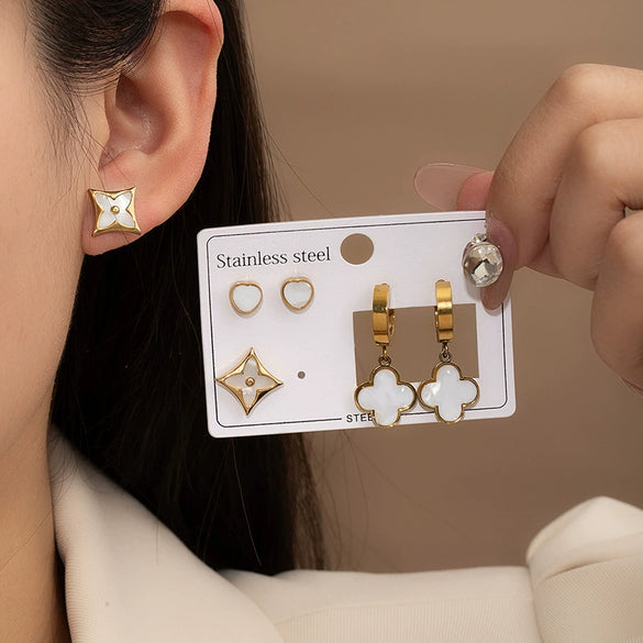 Wholesale Titanium Steel Women's Earrings Set With Heart Shape And Four Leaf Flower Pattern Electroplated