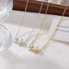 Wholesale Titanium Steel Women's Geometric Bowknot Necklace With Electroplating And O Word Chain