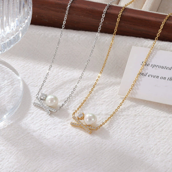 Wholesale Titanium Steel Women's Geometric Bowknot Necklace With Electroplating And O Word Chain