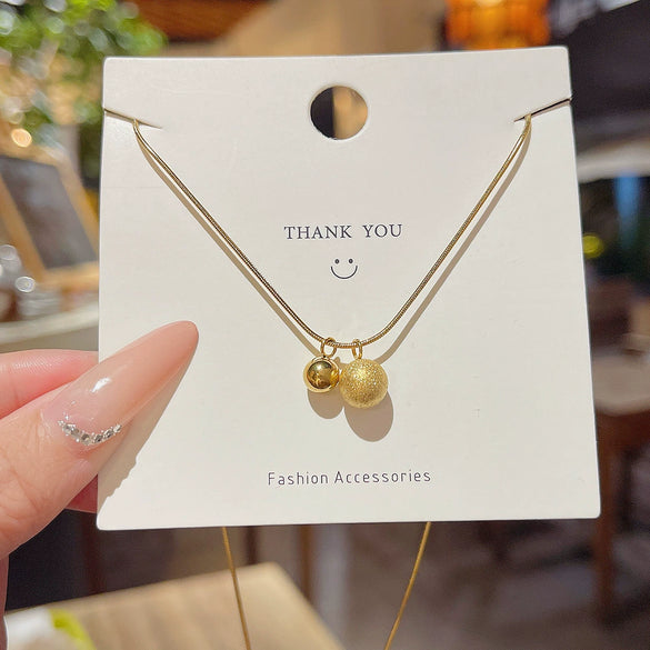 Wholesale Titanium Steel Women's Geometric Patterned Gold Ball Necklace With Electroplating And Snake Bone Chain