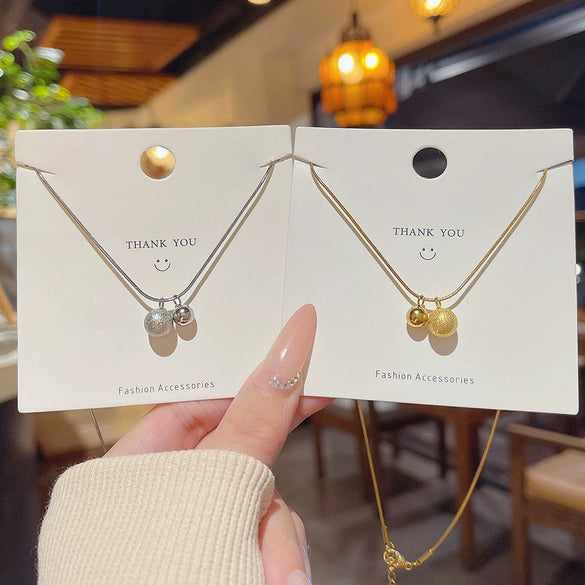 Wholesale Titanium Steel Women's Geometric Patterned Gold Ball Necklace With Electroplating And Snake Bone Chain