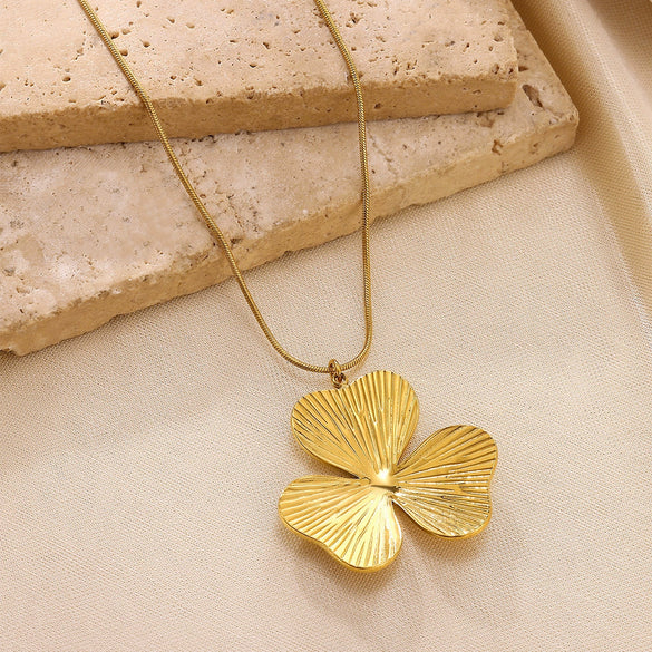 Wholesale Unisex Electroplated Gold Titanium Steel And Stainless Steel Exaggerated Flower Leaf Necklace Pendant With Cross Chain