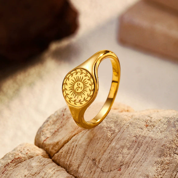 Wholesale Unisex Engraved Geometric Goldplated Titanium Steel Ring With Wreath Surrounding Sun Design