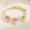 Wholesale Unisex Fashion Alloy Bracelet With Heart Flower Rhombus Letter Number Text Pendant Electroplated