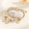 Wholesale Unisex Fashion Alloy Bracelet With Heart Flower Rhombus Letter Number Text Pendant Electroplated