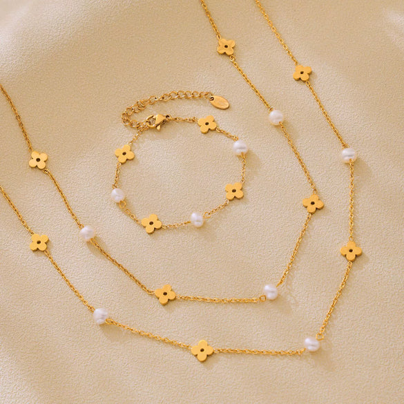 Wholesale Unisex Ferris Wheel Four Leaf Flower Electroplated Titanium Steel Necklace And Bracelet Jewelry