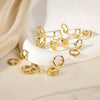 Wholesale Unisex Geometric And Heartshaped Copper Goldplated Earrings