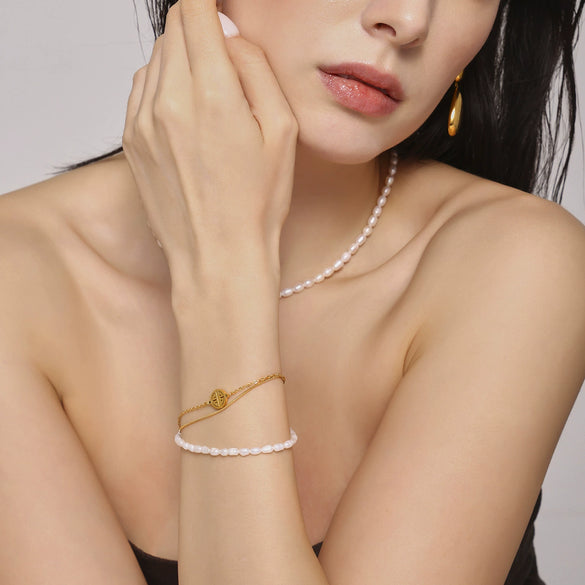 Wholesale Unisex Geometric Freshwater Pearl And Titanium Steel Goldplated Bracelet With Ferris Wheel Design