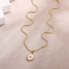 Wholesale Unisex Gold Electroplated Stainless Steel Scallop Inlaid Oval Cross Chain Necklace With White Enamel