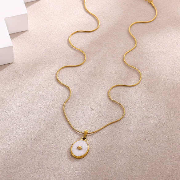Wholesale Unisex Gold Electroplated Stainless Steel Scallop Inlaid Oval Cross Chain Necklace With White Enamel