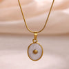 Wholesale Unisex Gold Electroplated Stainless Steel Scallop Inlaid Oval Cross Chain Necklace With White Enamel