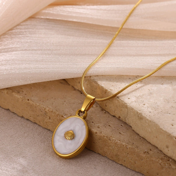 Wholesale Unisex Gold Electroplated Stainless Steel Scallop Inlaid Oval Cross Chain Necklace With White Enamel