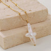 Wholesale Unisex Natural Freshwater Baroque Pearl Alien Shape Cross Pendant Titanium Steel Jewelry
