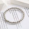 Wholesale Unisex Retro Simple Alloy Round Bead Elastic Bracelet With Electrophoresis Gold Treatment