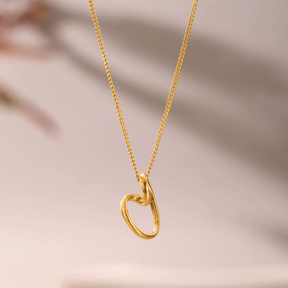 Wholesale Unisex Simple Geometric Ferris Wheel Asymmetrical Heart Pendant Necklace Made Of Titanium Steel With Electroplating Design