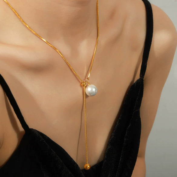 Wholesale Unisex Simple Geometric Titanium Steel Electroplated Necklace With Snake Chain And Round Bead Tassel Pendant