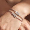 Wholesale Unisex Stainless Steel Electroplated Beaded Bracelet With Hollow Heart And Doll Pattern