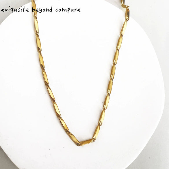 Wholesale Unisex Stainless Steel Handmade Melon Seed Chain Necklace With Geometric Pendant And Polishing Treatment