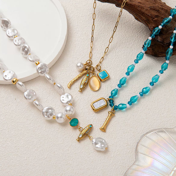 Wholesale Unisex Titanium Steel Zircon Small Fish Pearl Pendant Necklace And Earrings In Baroque And Minimalist Style