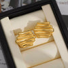 Wholesale Versatile Geometric Exaggerated Retro Glossy Asymmetrical Striped Copper Electroplated Women's Earrings