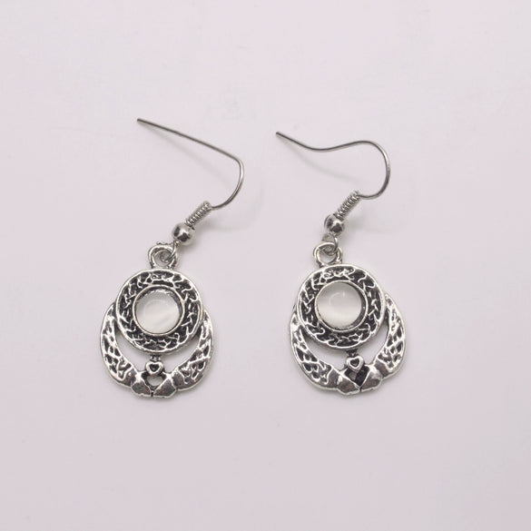 Wholesale Vintage Geometric Alloy Dropshaped Moonstone Handheld Earrings With Electroplating