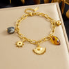 Wholesale Vintage Geometric Leopard Print Fanshaped Goldplated Sun Pendant Stainless Steel Beaded Bracelet For Women