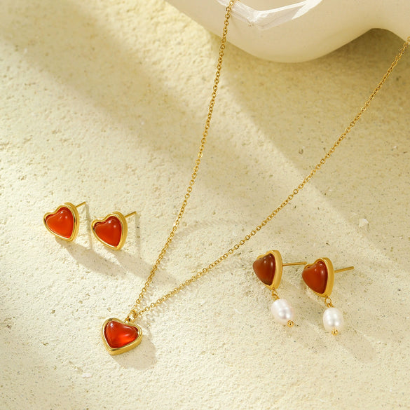 Wholesale Vintage Stainless Steel 18K Heart Shaped Pendant Necklace And Earrings Set Inlaid With Red Agate And Natural Pearl For Women With Electroplating Treatment