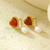 Wholesale Vintage Stainless Steel 18K Heart Shaped Pendant Necklace And Earrings Set Inlaid With Red Agate And Natural Pearl For Women With Electroplating Treatment