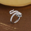 Wholesale Winding Greeneyed Snake Ring In Copper With Zircon Inlay And Electroplating Geometric Finger Ring