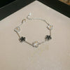 Wholesale Women Copper Light Luxury Flower Diamond Striped Electroplating Bracelet