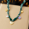 Wholesale Women's Accessories Retro Printed Stainless Steel Electroplated Heart Water Drop Bell Shaped Necklace Bracelet Suit