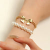 Wholesale Women's Alloy Beaded Bracelet With Irregular Imitation Pearl Stitching And Bow Tie Pendant Electroplating Design