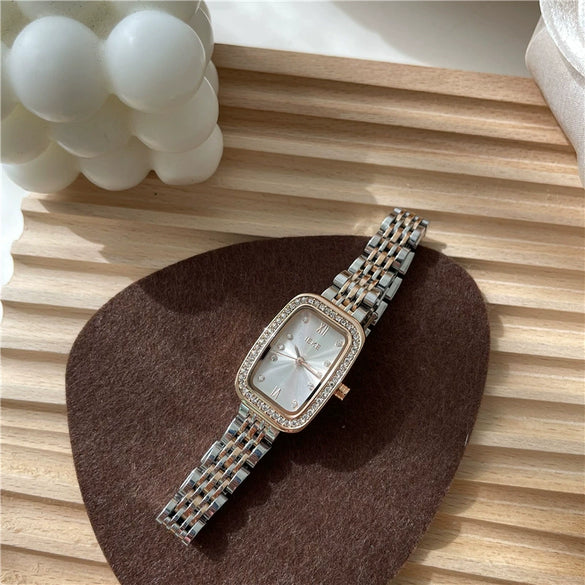 Wholesale Women's Alloy Case Quartz Watch With Rhinestone Oval Dial And Refined Steel Belt Business Style