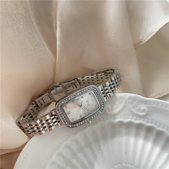 Wholesale Women's Alloy Case Quartz Watch With Rhinestone Oval Dial And Refined Steel Belt Business Style