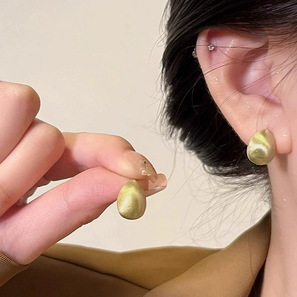 Wholesale Women's Alloy Dropshaped Frosted Brushed Stud Earrings With Electroplating Treatment