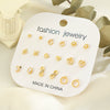 Wholesale Women's Alloy Earrings And Ring Set With Golden Pearl And Rhinestone Geometric Heart Letter Number And Text Patterns Electroplated
