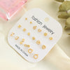 Wholesale Women's Alloy Earrings And Ring Set With Golden Pearl And Rhinestone Geometric Heart Letter Number And Text Patterns Electroplated