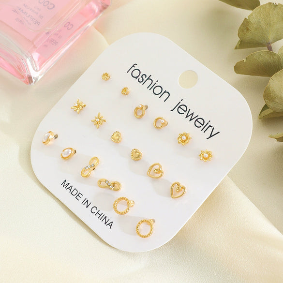 Wholesale Women's Alloy Earrings And Ring Set With Golden Pearl And Rhinestone Geometric Heart Letter Number And Text Patterns Electroplated