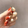 Wholesale Women's Alloy Earrings Cold Style Asymmetric Pearl Natural Geometric Electroplated