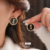 Wholesale Women's Alloy Earrings With Black Round Shape And Letter Pattern Electroplated Highend Style