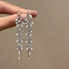 Wholesale Women's Alloy Electroplated Flower Pattern Light Luxury High Sense French Tassel Earrings