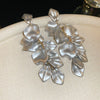 Wholesale Women's Alloy Electroplated Flower Pattern Light Luxury High Sense French Tassel Earrings