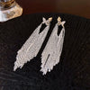 Wholesale Women's Alloy Electroplated Flower Pattern Light Luxury High Sense French Tassel Earrings