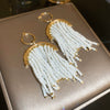 Wholesale Women's Alloy Electroplated Flower Pattern Light Luxury High Sense French Tassel Earrings